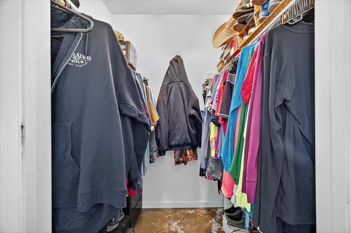 35102 Quail Oak Road Auberry, CA 93602 - Photo 34 of 61 a view of walk in closet with clothes