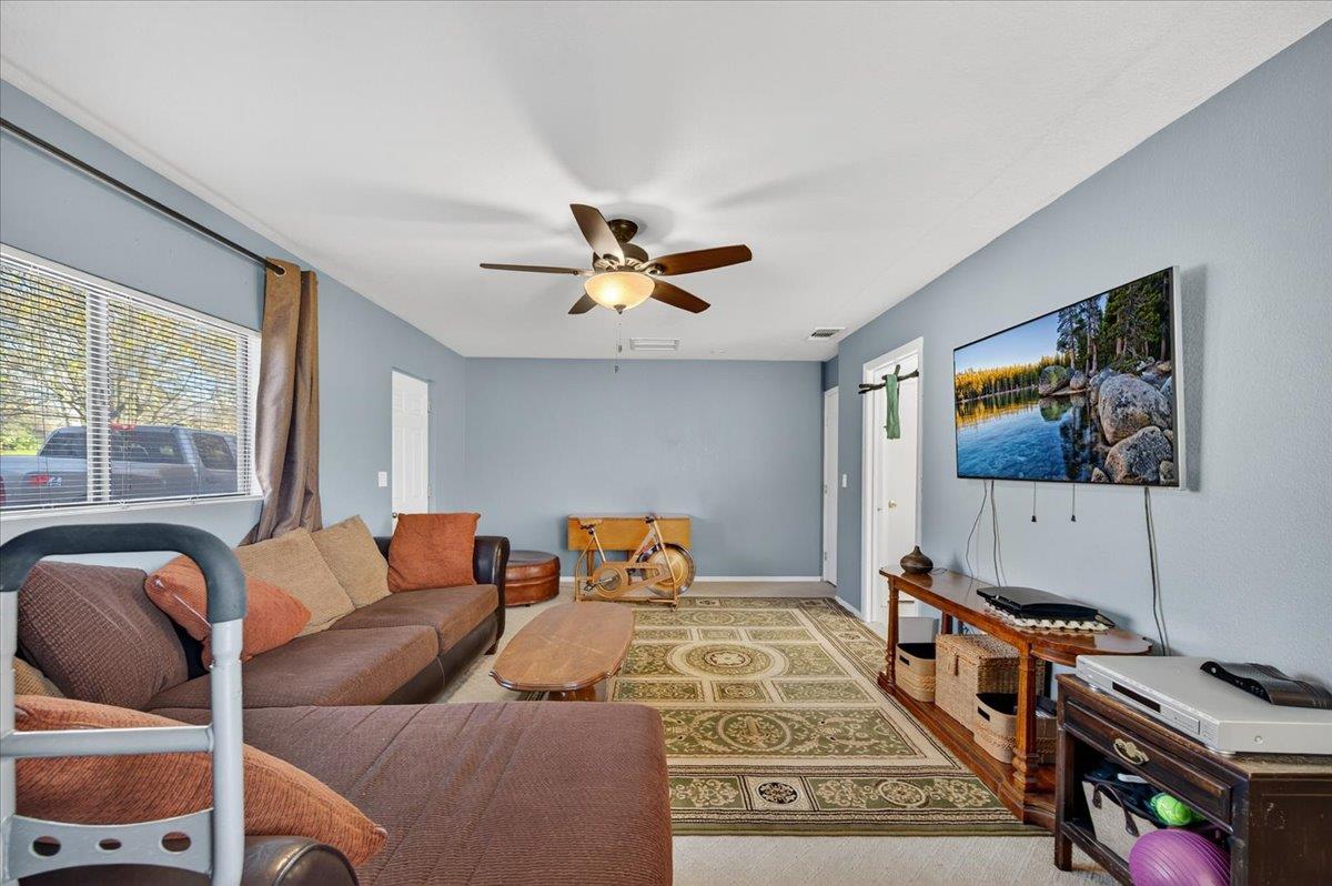 35102 Quail Oak Road Auberry, CA 93602 - Photo 45 of 61 a bedroom with furniture and window