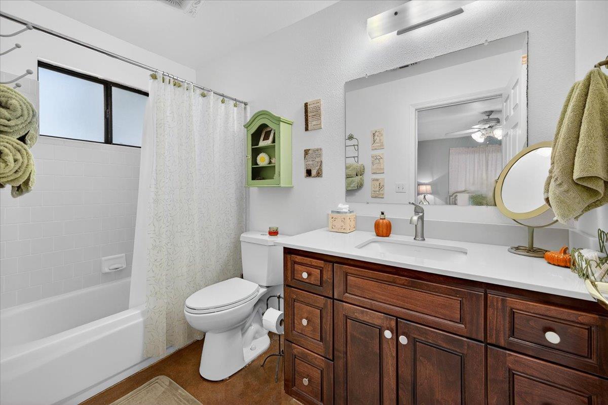 35102 Quail Oak Road Auberry, CA 93602 - Photo 51 of 61 a bathroom with a sink a toilet and shower