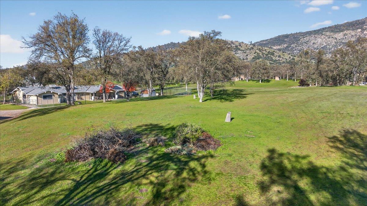 35102 Quail Oak Road Auberry, CA 93602 - Photo 7 of 61 a view of a lake with houses