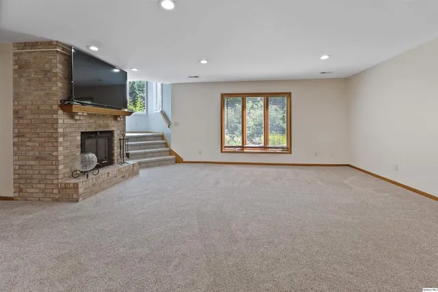 a view of a livingroom with a fireplace