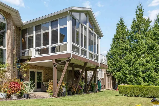 a house with a tree in front of it
