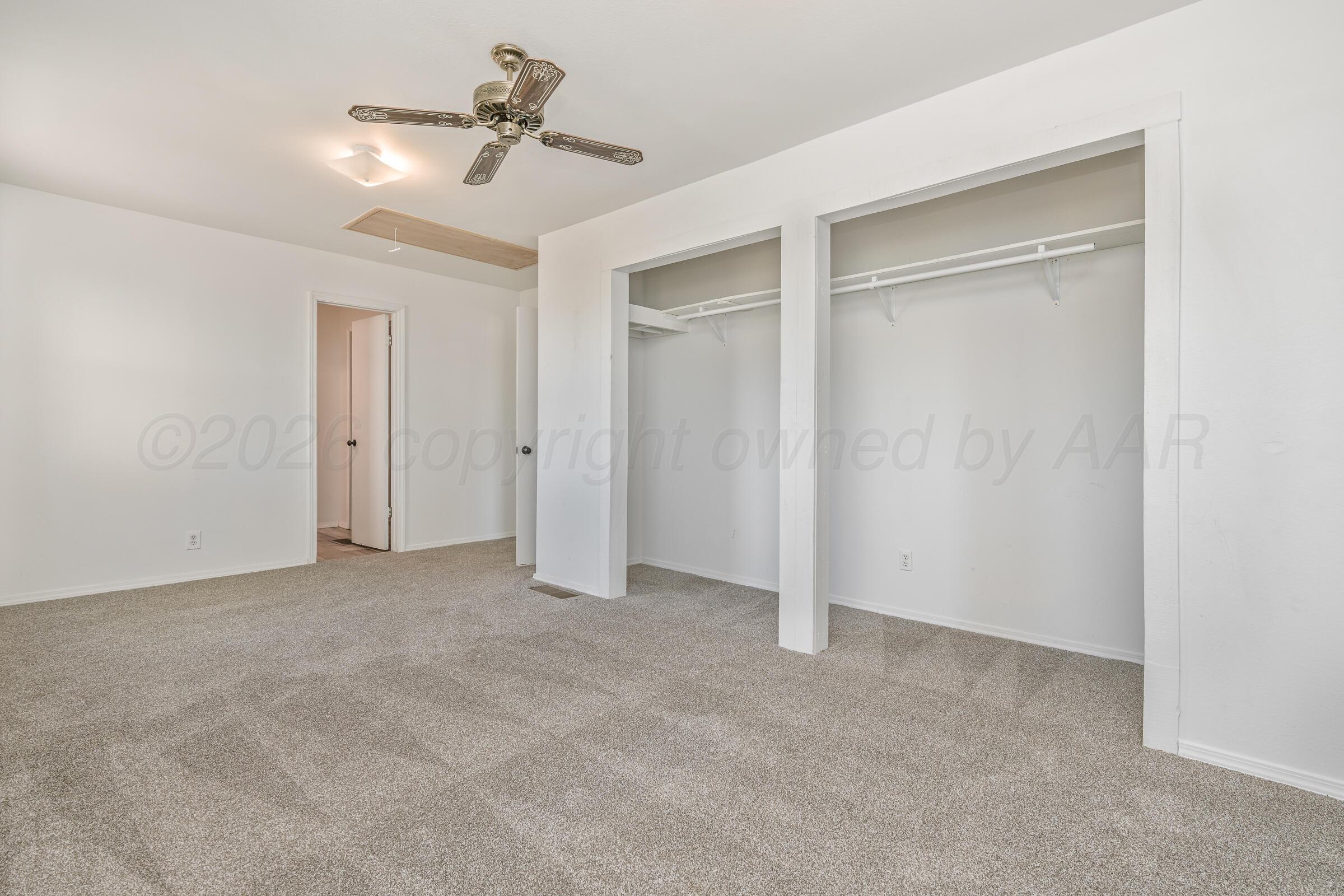 910 8th Avenue Canyon, TX 79015 - Photo 20 of 22 a view of empty room with ceiling fan