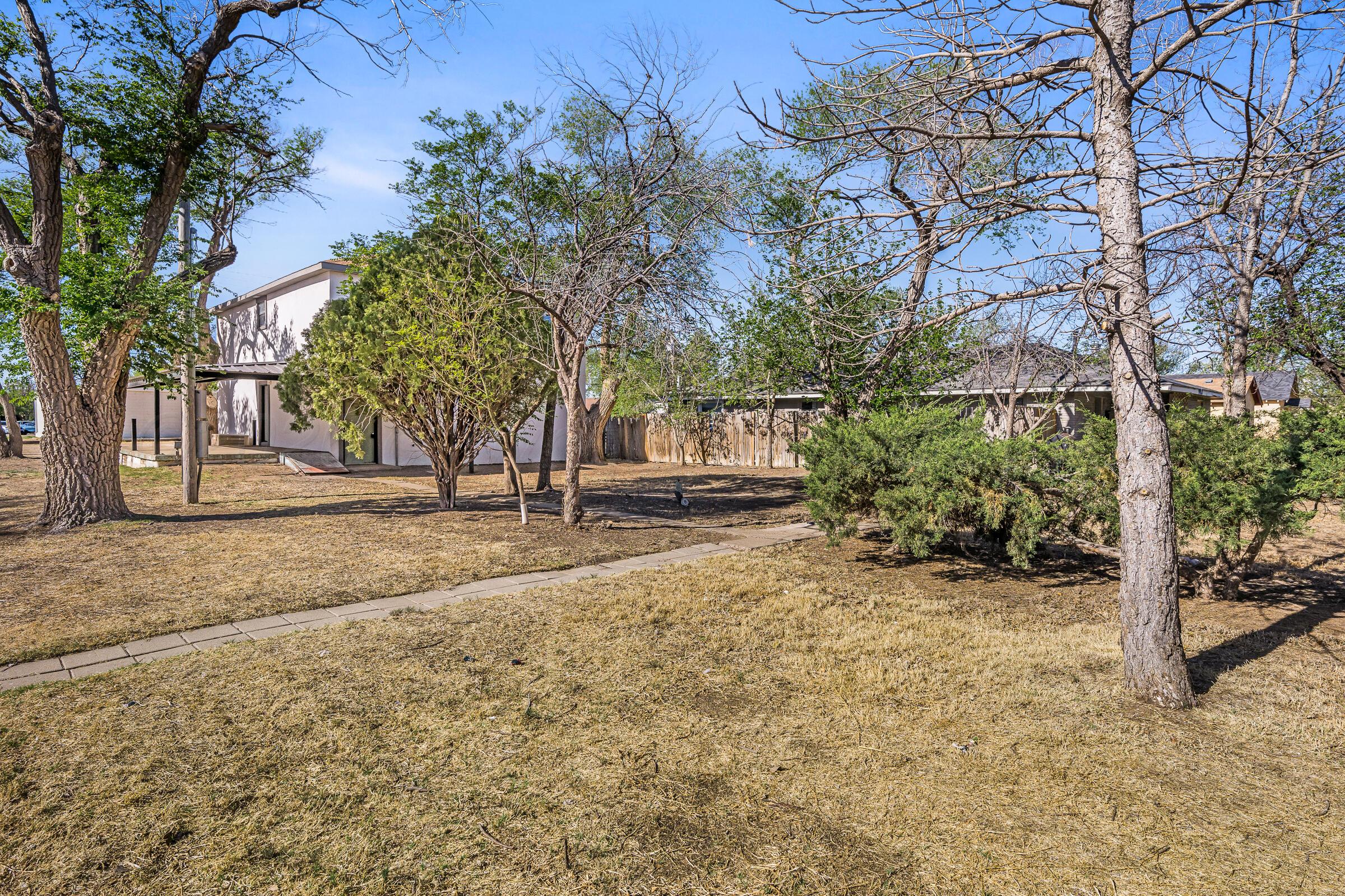 910 8th Avenue Canyon, TX 79015 - Photo 2 of 22 a view of outdoor space with trees