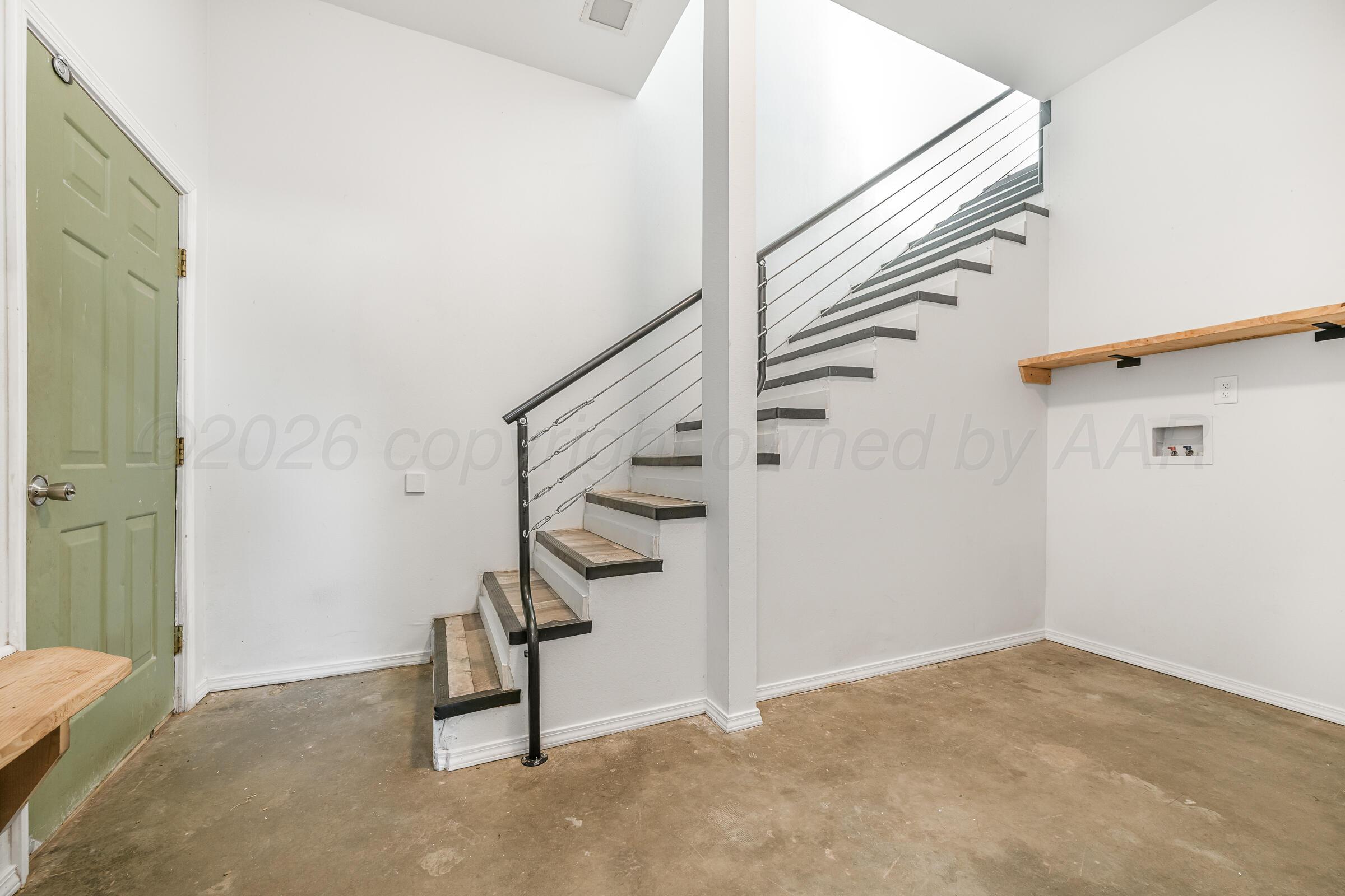 910 8th Avenue Canyon, TX 79015 - Photo 6 of 22 a view of entryway with stairs
