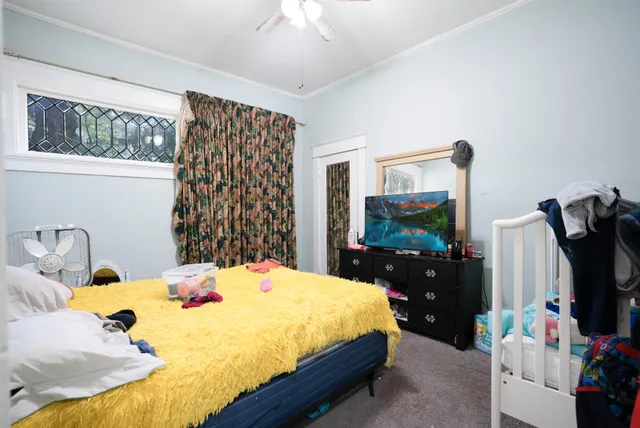 a kitchen with a sink cabinets and window