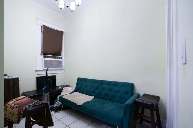 a kitchen with stainless steel appliances granite countertop a sink a stove and a window