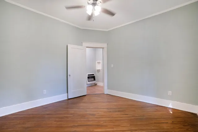 a view of a bathroom with a sink and a mirror