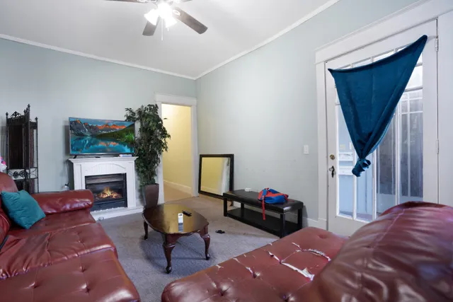 a bedroom with a bed and a table