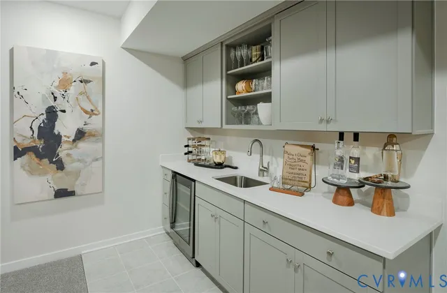 a kitchen with a sink and cabinets