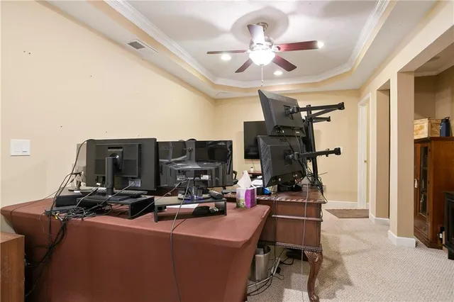 a large kitchen with a table and chairs