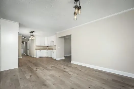 a view of a kitchen with a sink