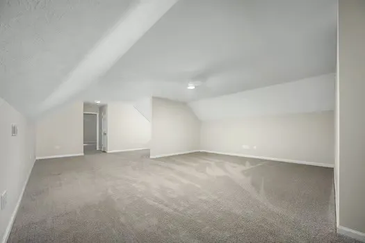 an empty room with a natural light