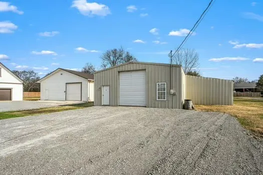 a view of an empty room with a garage