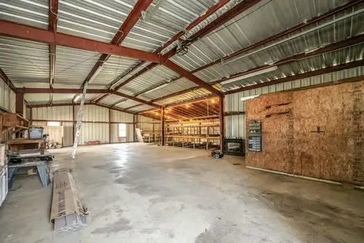 a view of a big yard with a fountain