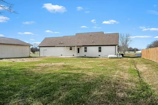 a view of a garden with a bench