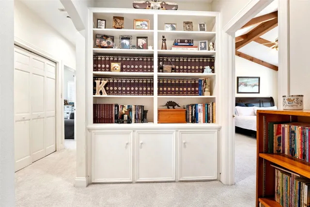 an aerial view of residential houses with outdoor space and city view