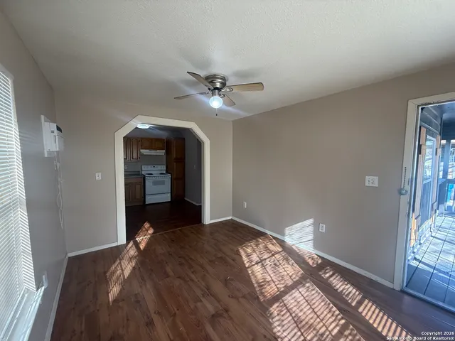 a kitchen with a refrigerator stove and a sink