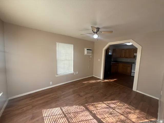 a view of backyard with a small cabin