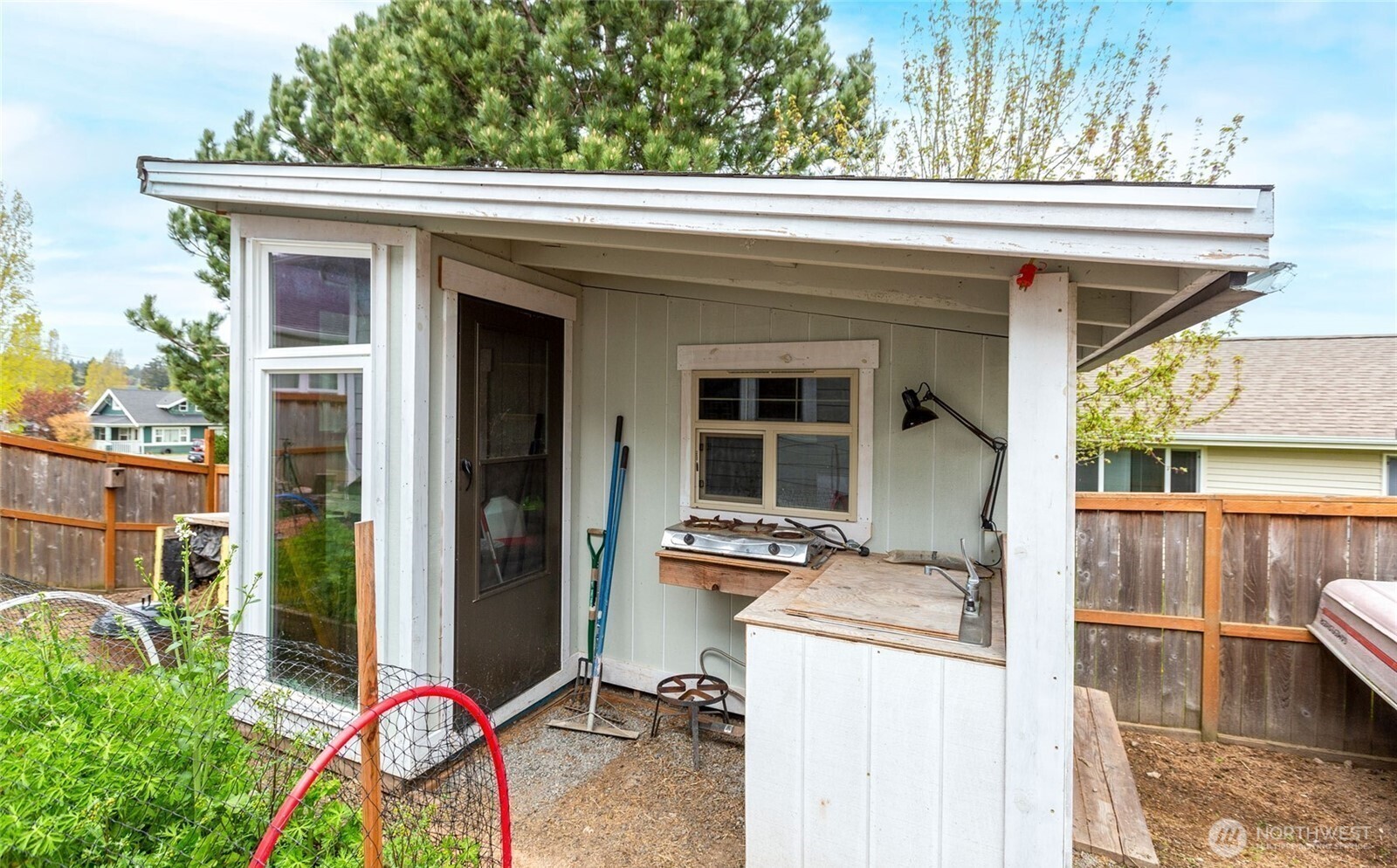 65 Gerard Lane Friday Harbor, WA 98250 - Photo 19 of 21 a view of a patio with table and chairs and potted plants