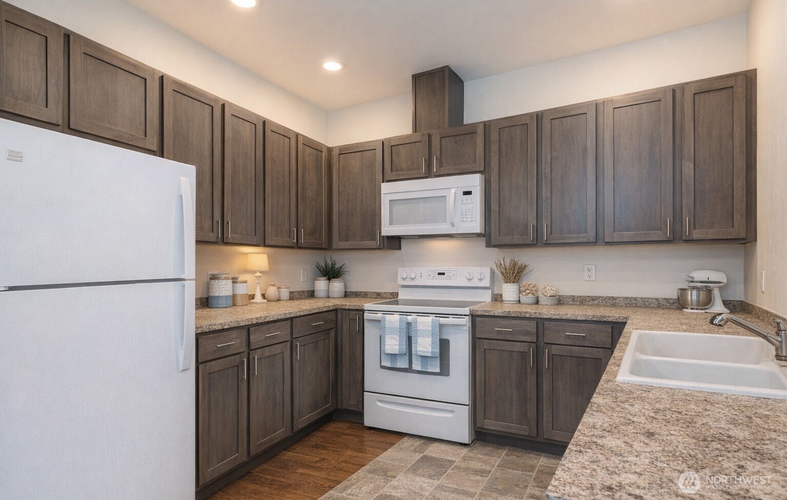 65 Gerard Lane Friday Harbor, WA 98250 - Photo 5 of 21 a kitchen with a sink refrigerator and cabinets