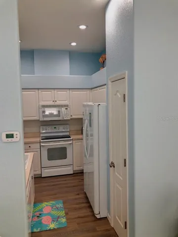 a kitchen with stainless steel appliances a stove and a refrigerator