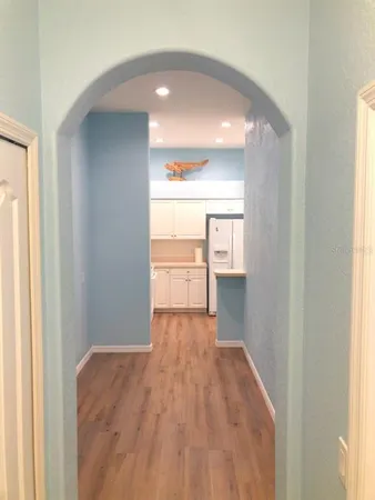 a view of a room with a sink and a window