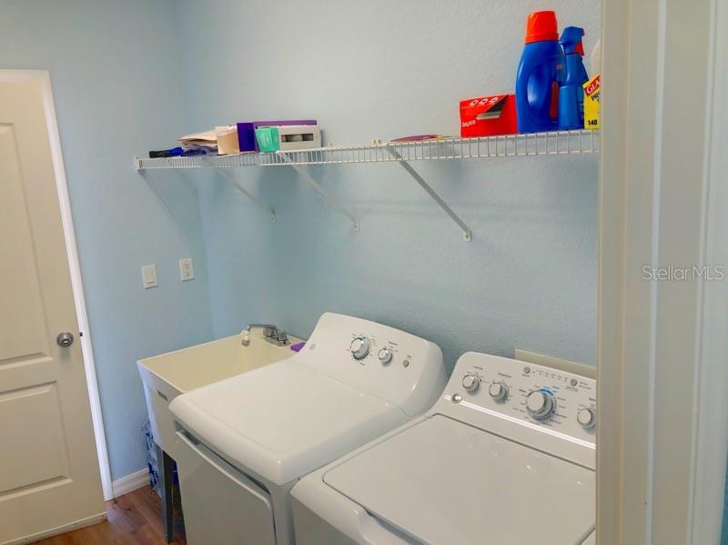 1211 Hot Springs Point Englewood, FL 34223 - Photo 14 of 30 a utility room with dryer and washer