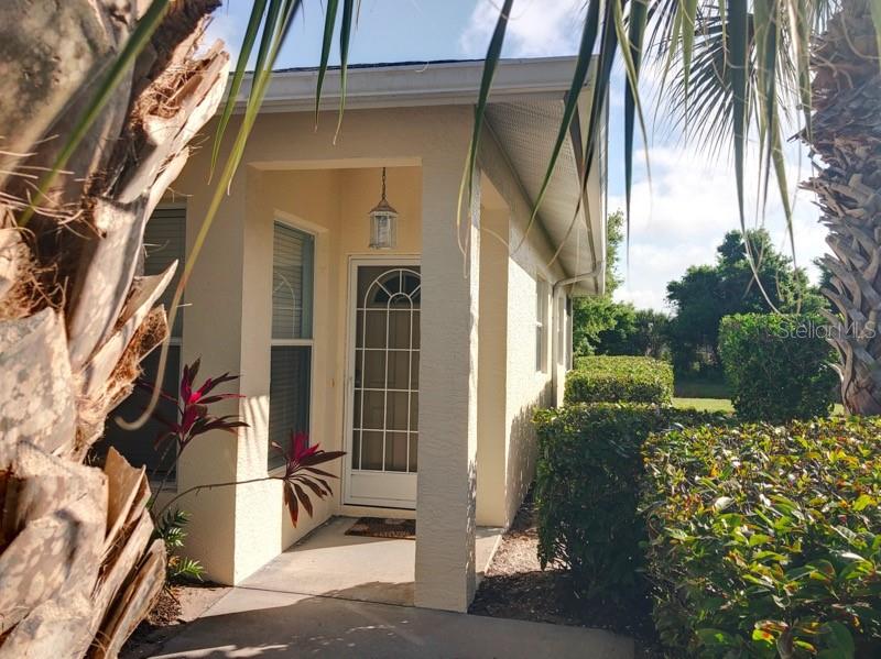 1211 Hot Springs Point Englewood, FL 34223 - Photo 2 of 30 a view of a house with a door
