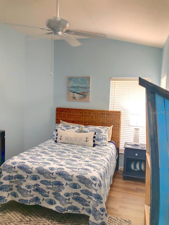 1211 Hot Springs Point Englewood, FL 34223 - Photo 22 of 30 a bedroom with a bed and a window