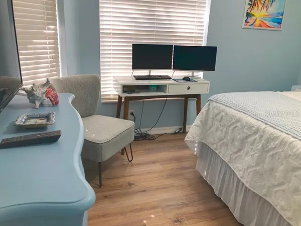 a workspace with furniture and window