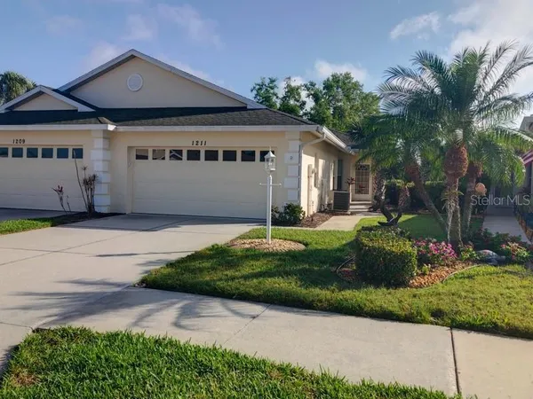 a view of a house with a big yard