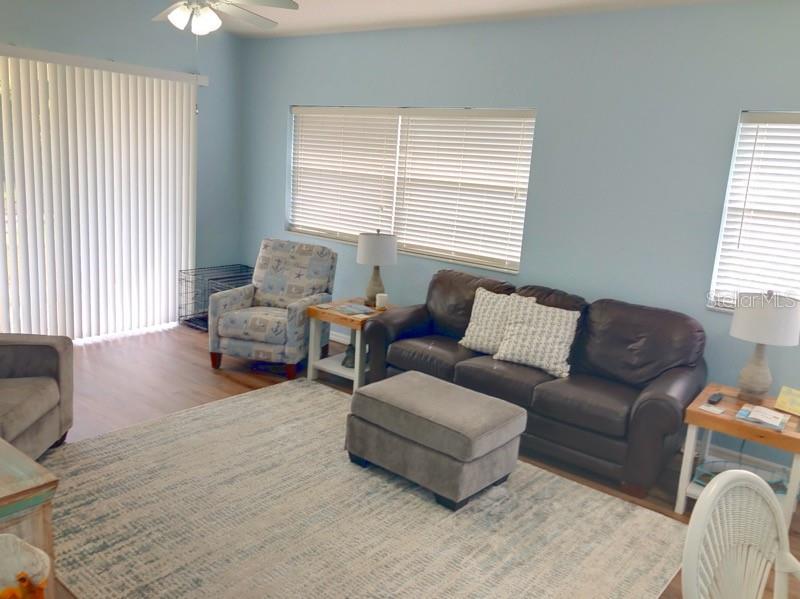 1211 Hot Springs Point Englewood, FL 34223 - Photo 6 of 30 a living room with furniture and a window