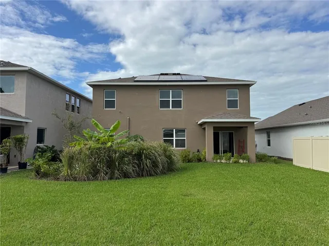 a view of a garden with a lake