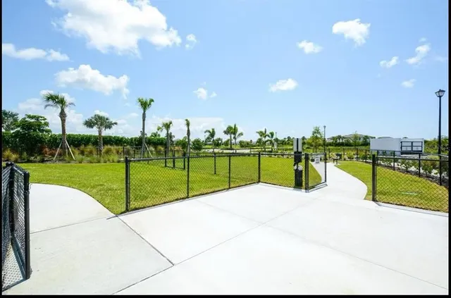 front view of a house with a garden
