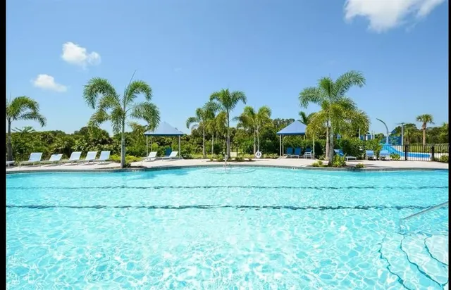 a view of a lake with a park