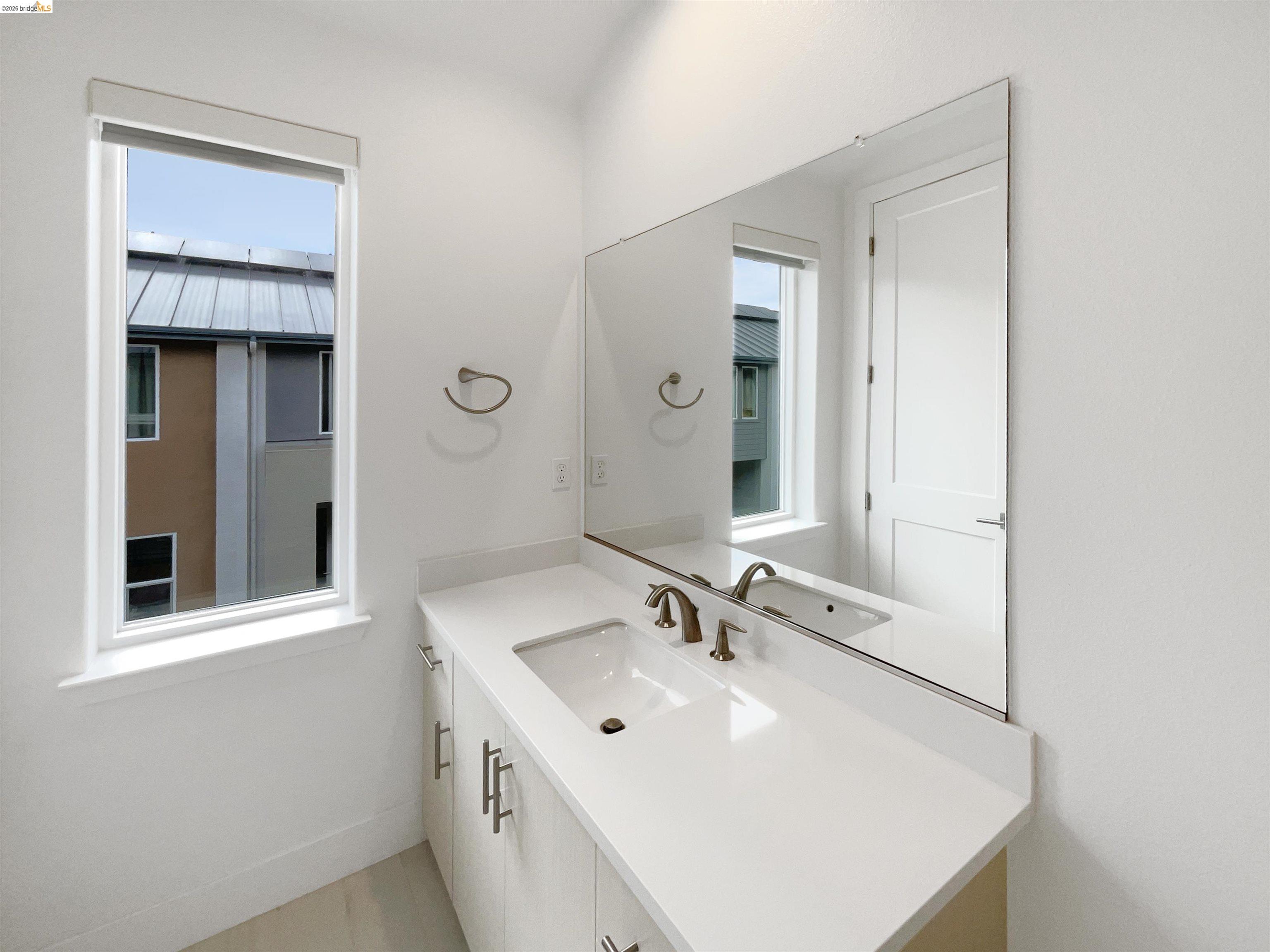 3419 Router Common Fremont, CA 94538 - Photo 18 of 26 Bathroom featuring vanity and plenty of natural light