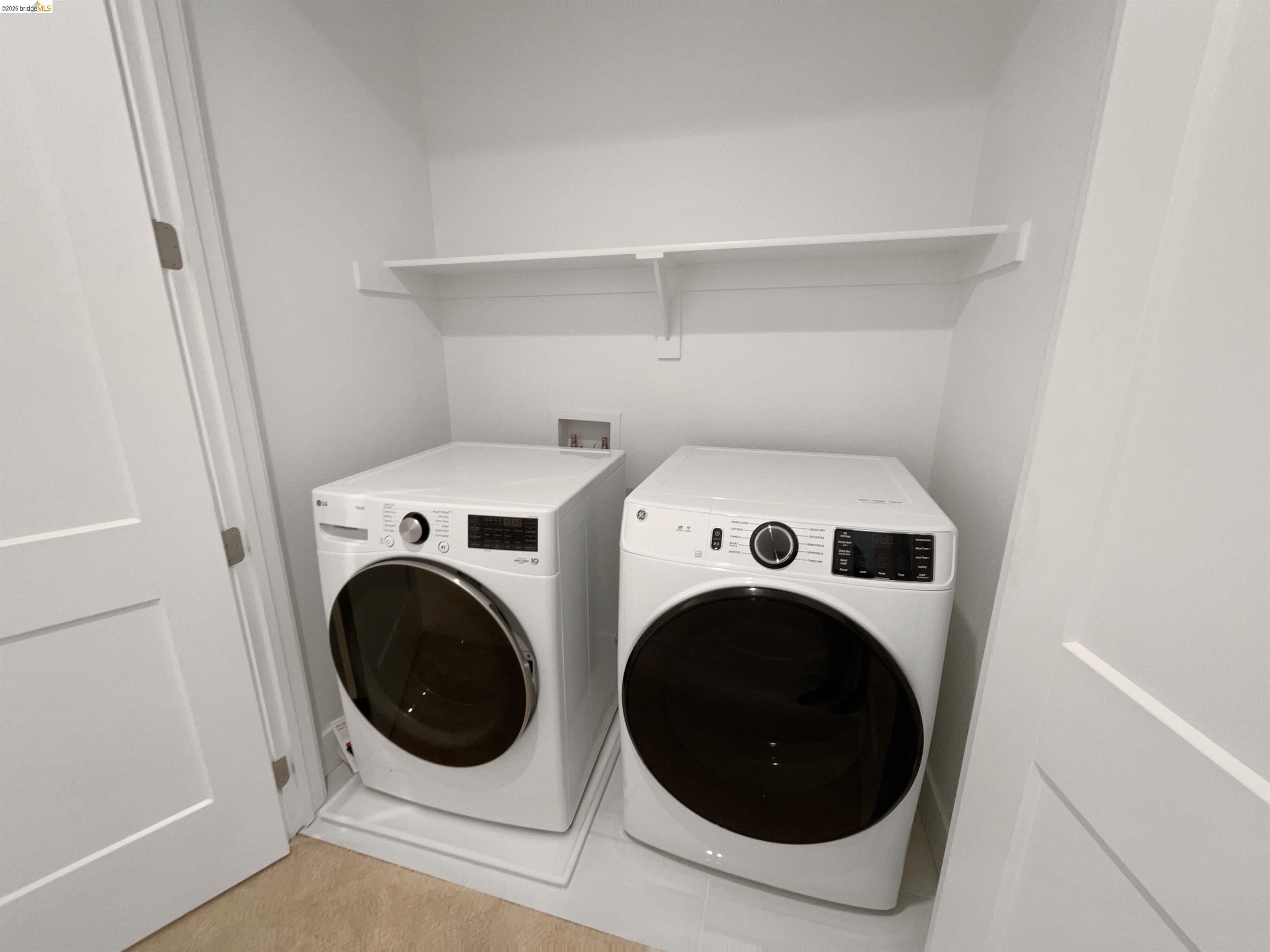 3419 Router Common Fremont, CA 94538 - Photo 19 of 26 Laundry room featuring washer and clothes dryer
