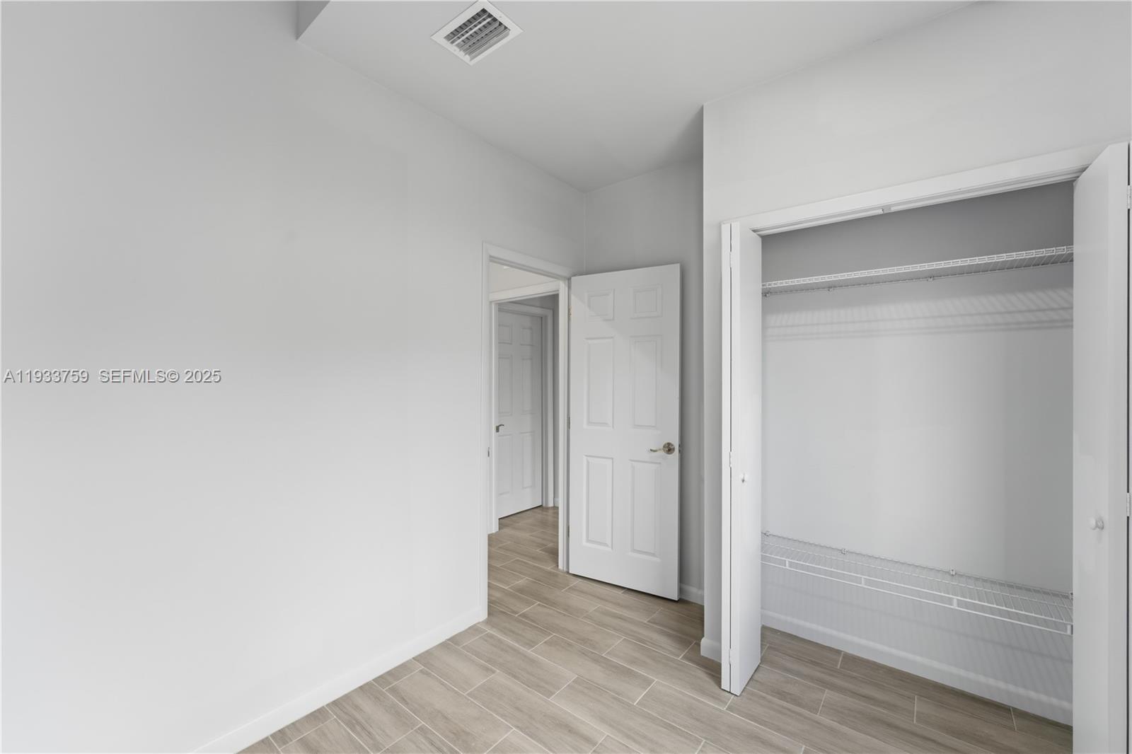 1393 Northwest 31st Street, Unit A Miami, FL 33142 - Photo 15 of 21 a view of an empty room