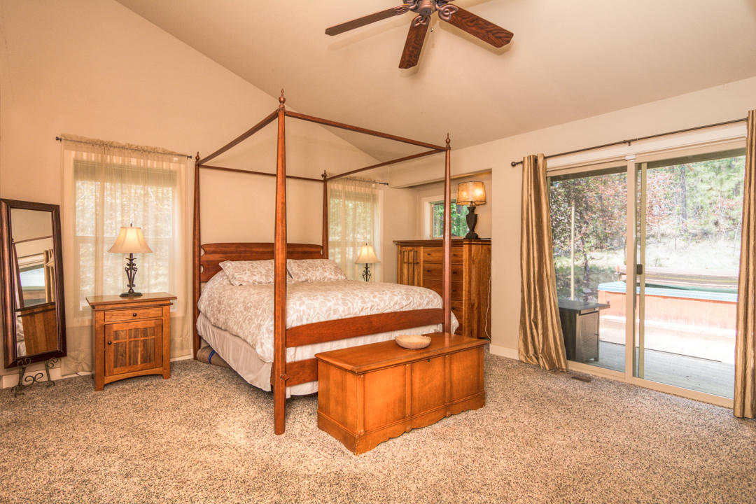17065 Azusa Road Bend, OR 97707 - Photo 17 of 37 The Prmary Suite also has access to the rear deck and hot tub.