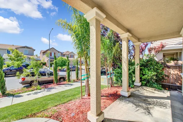 a view of yard with an outdoor seating