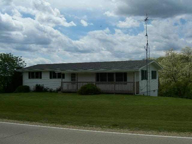 a view of a yard in front of a house