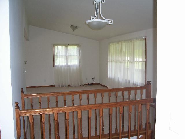 4374 South Derinda Road Elizabeth, IL 61028 - Photo 2 of 7 a bedroom with windows