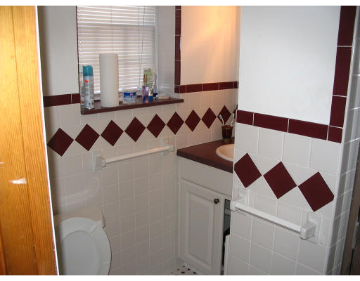 27 Chamberlain Road Chelmsford, MA 01824 - Photo 11 of 11 a bathroom with a bathtub and shower
