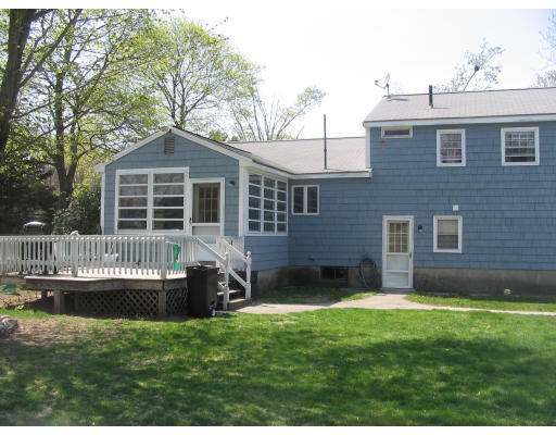 27 Chamberlain Road Chelmsford, MA 01824 - Photo 4 of 11 a view of house with a yard