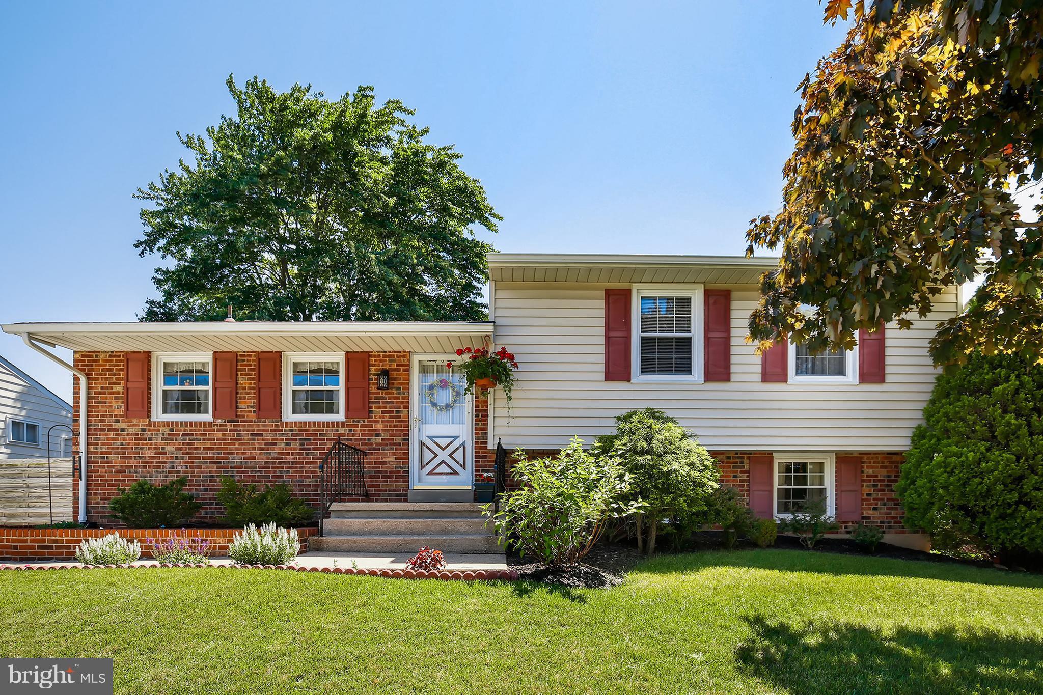 9007 Kilbride Road Baltimore, MD 21236 - Photo 1 of 30 a front view of a house with a yard