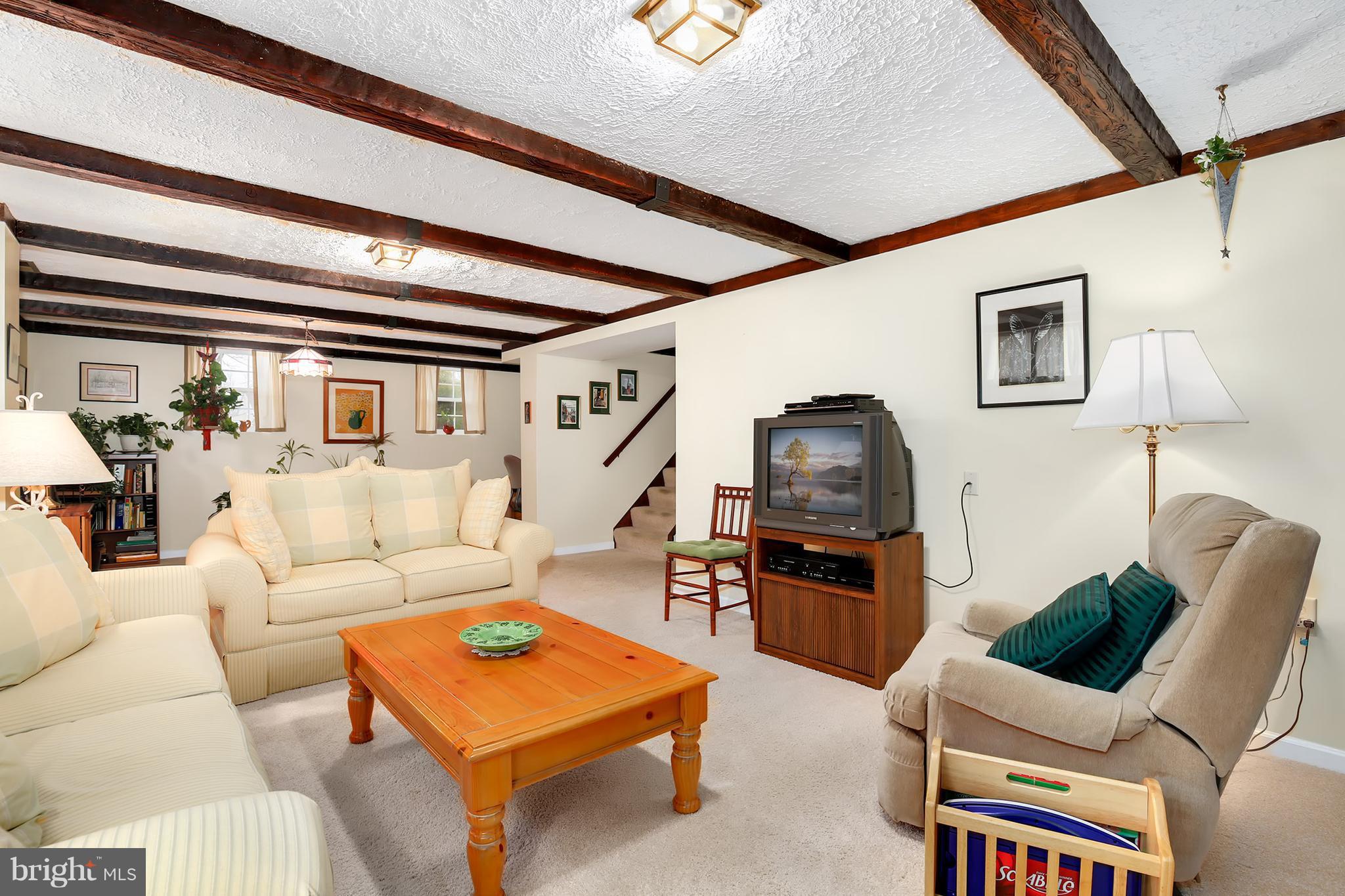 9007 Kilbride Road Baltimore, MD 21236 - Photo 21 of 30 a living room with furniture and a wooden floor
