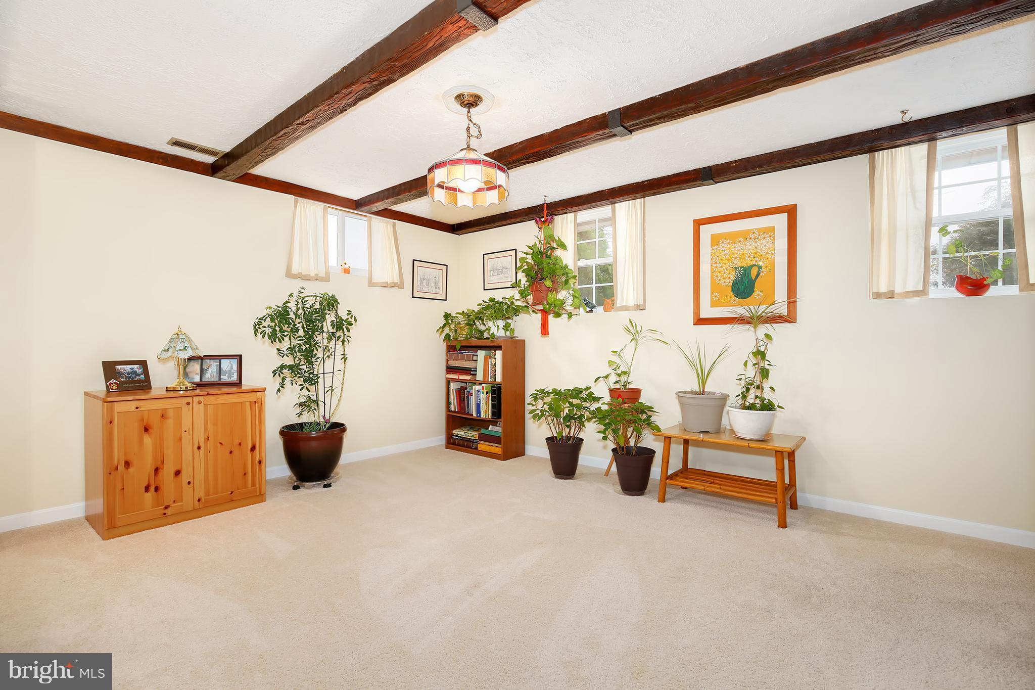 9007 Kilbride Road Baltimore, MD 21236 - Photo 22 of 30 a view of a room with window and furniture