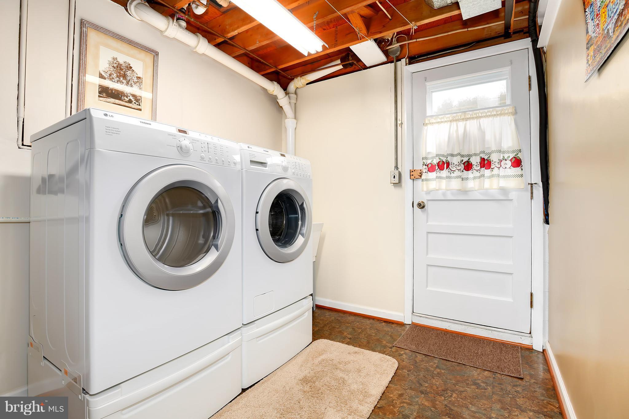 9007 Kilbride Road Baltimore, MD 21236 - Photo 24 of 30 a utility room with dryer and washer