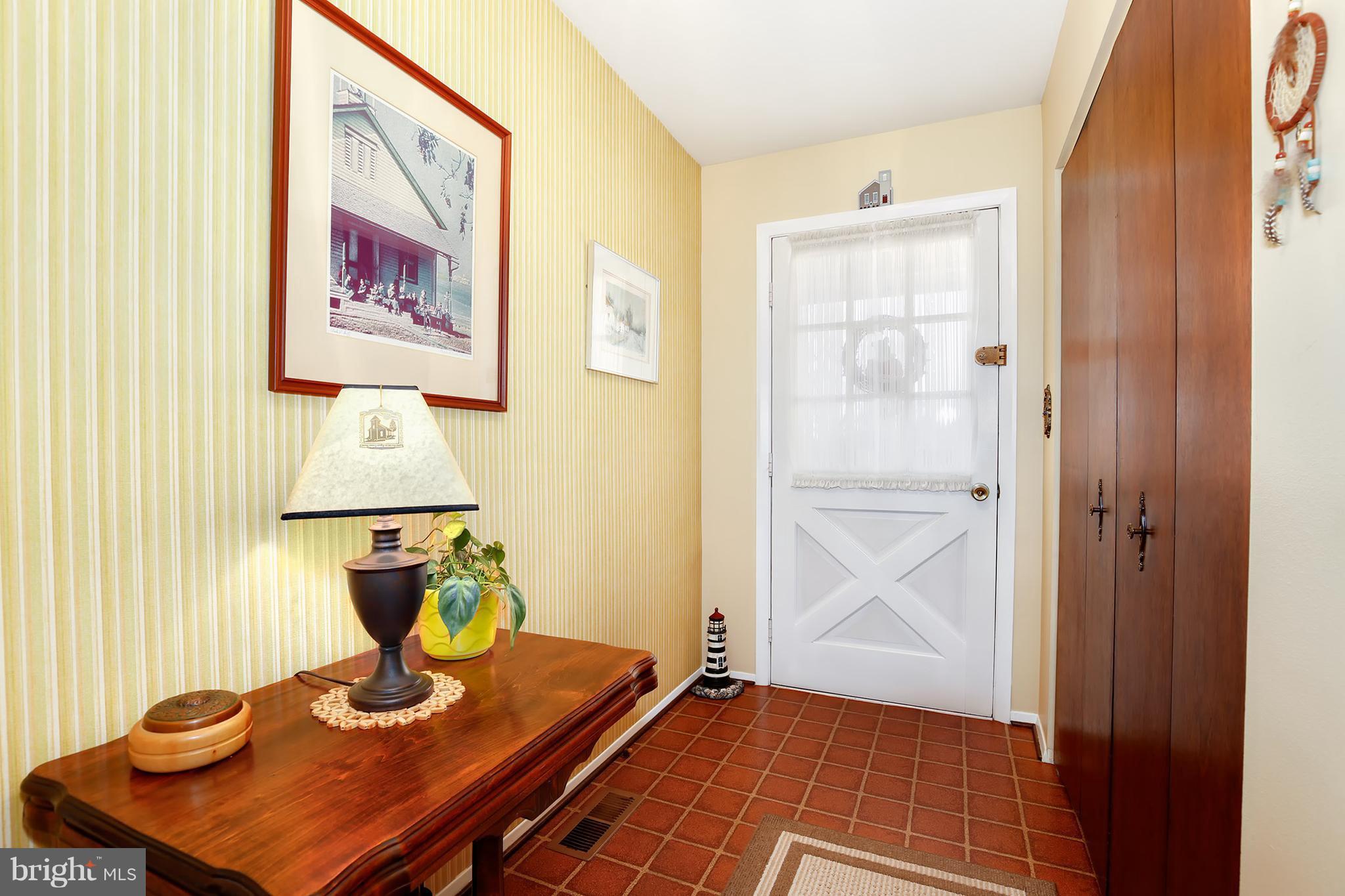 9007 Kilbride Road Baltimore, MD 21236 - Photo 4 of 30 a view of dining room with wooden floor